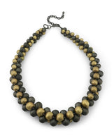 Cultural Elements gold and gunmetal-tone layered statement necklace with twisted beads and adjustable chain.
