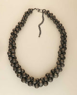 Cultural Elements antique gunmetal-tone layered statement necklace with lightweight metal beads and adjustable extender.