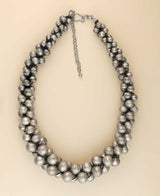 Cultural Elements antique silver-tone layered statement necklace with stacked metal beads and adjustable chain.