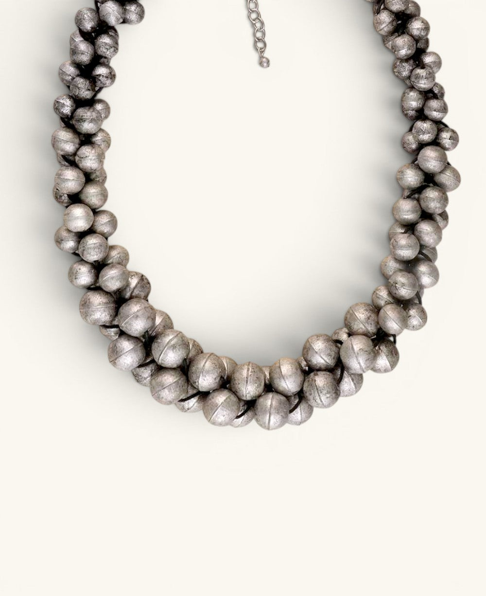 Cultural Elements antique silver-tone layered statement necklace with stacked metal beads and adjustable chain.
