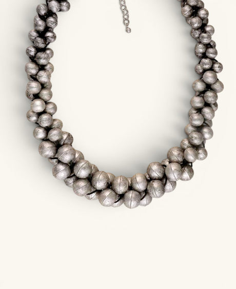 Cultural Elements antique silver-tone layered statement necklace with stacked metal beads and adjustable chain.