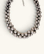 Cultural Elements antique silver-tone layered statement necklace with stacked metal beads and adjustable chain.