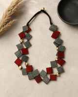 Double-Strand Deep Red and Gray Horn Necklace with Brass Accents — necklaces, lifestyle vanity lifestyle photo