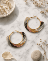 Earth-Tone Beaded Hoop Earrings — earrings, editorial marble lifestyle photo