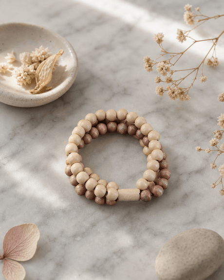 Earthen Charm Brown Beaded Bracelet — bracelets, editorial marble lifestyle photo