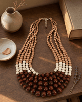 Earthy Brown Cascade Wood Necklace — necklaces, sunlit shelf lifestyle photo