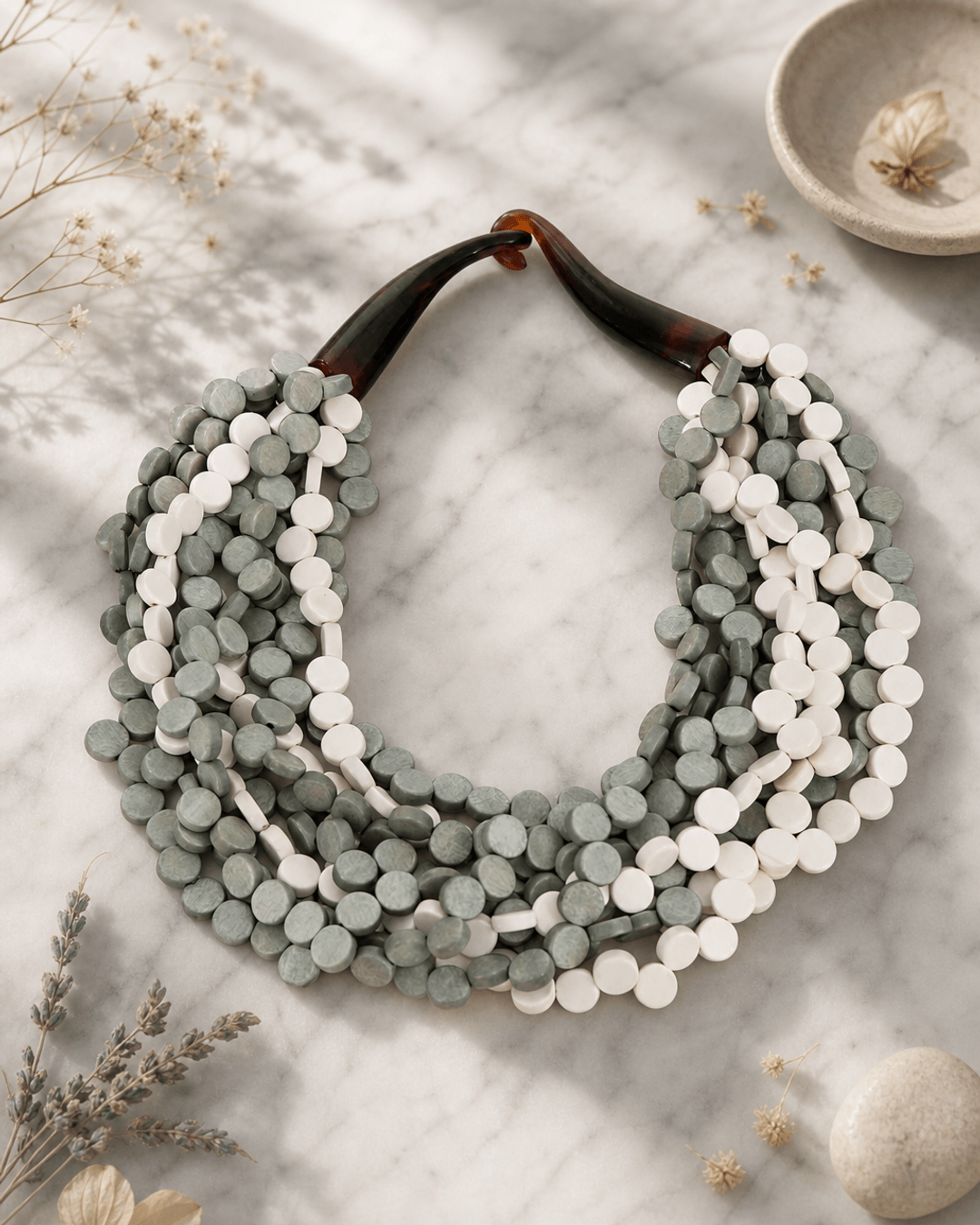 Grey and Cream Layered Necklace — necklaces, editorial marble lifestyle photo