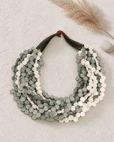 Grey and Cream Layered Necklace — necklaces, editorial plaster shadow lifestyle photo
