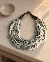 Grey and Cream Layered Necklace — necklaces, vibey rim light linen surface lifestyle photo