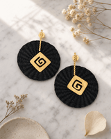 Emblem Colombian Artisanal Iraca Palm Earrings — earrings, editorial marble lifestyle photo