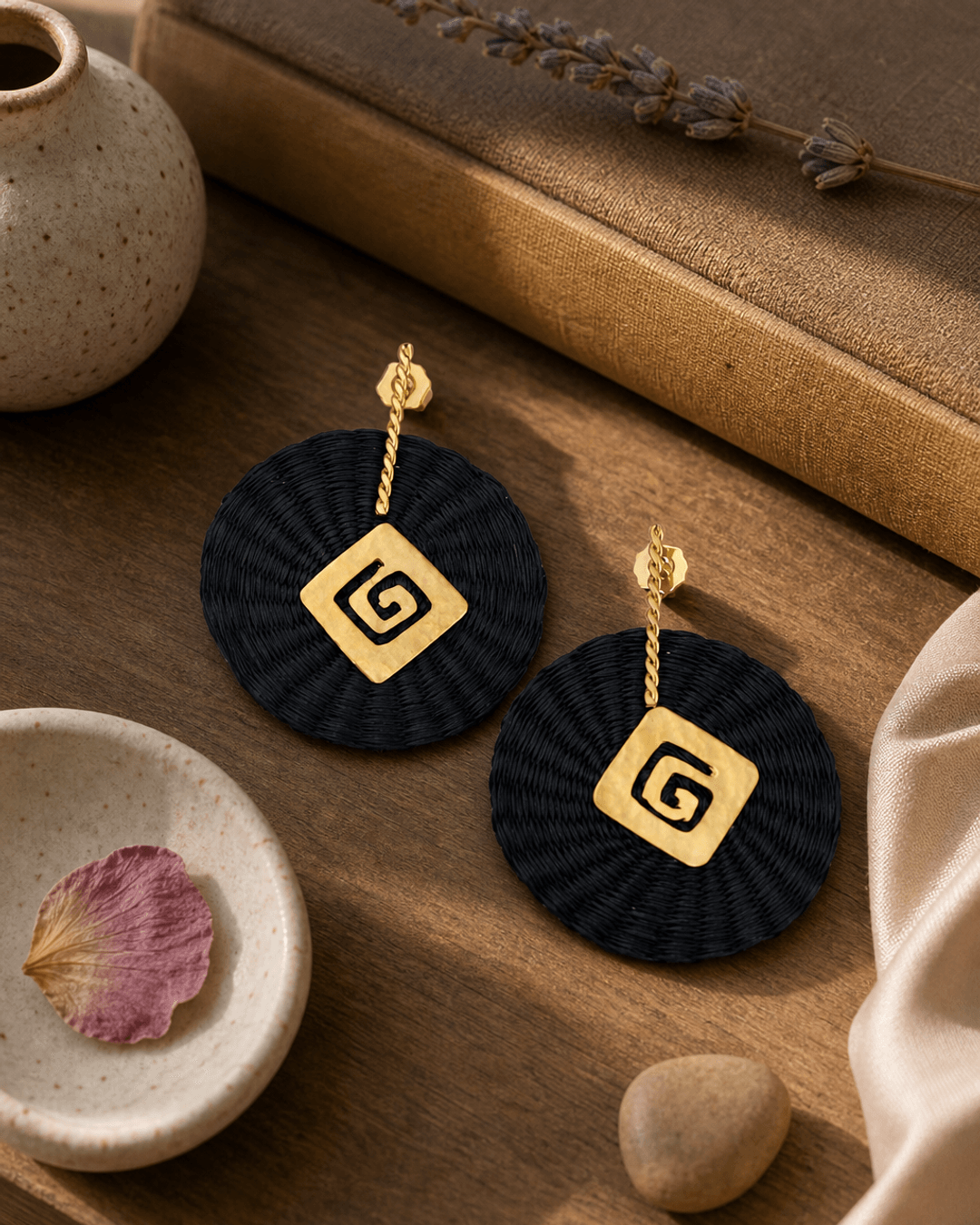 Emblem Colombian Artisanal Iraca Palm Earrings — earrings, sunlit shelf lifestyle photo