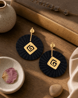 Emblem Colombian Artisanal Iraca Palm Earrings — earrings, sunlit shelf lifestyle photo