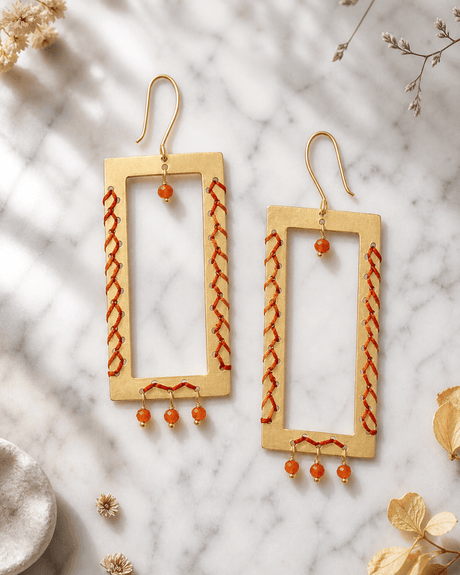 Geometric Brass Earrings with Carnelian Beads — earrings, editorial marble lifestyle photo