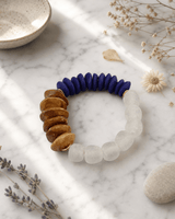 Global Harmony Stack Bracelet – Bone, Ashanti Glass & Recycled Glass — bracelets, editorial marble lifestyle photo