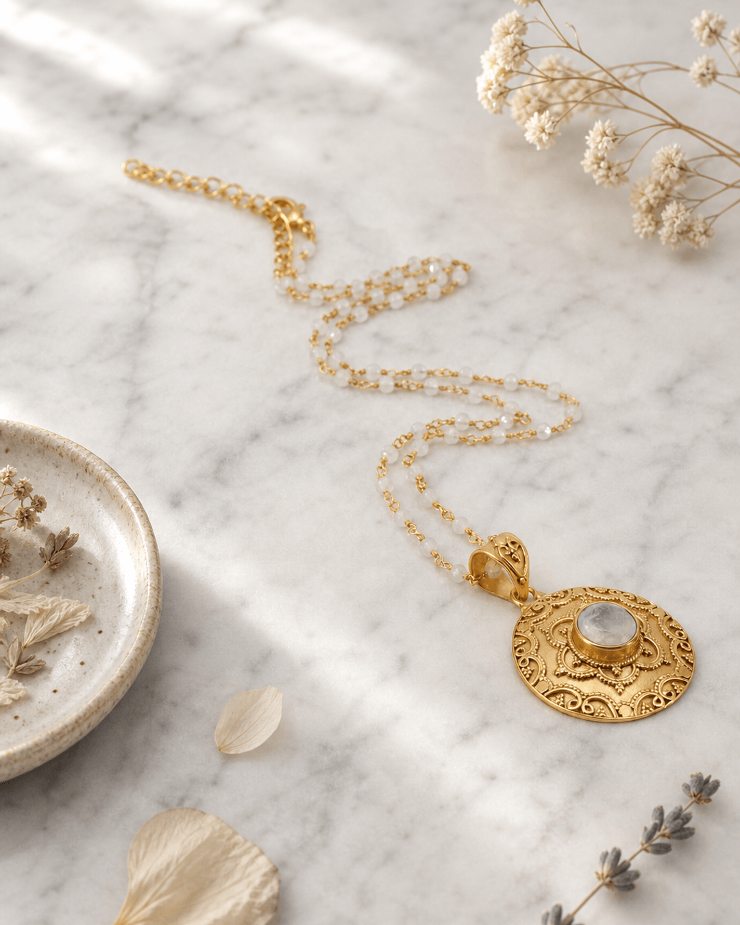 Gold Plated Rainbow Moonstone Floral Necklace — necklaces, editorial marble lifestyle photo
