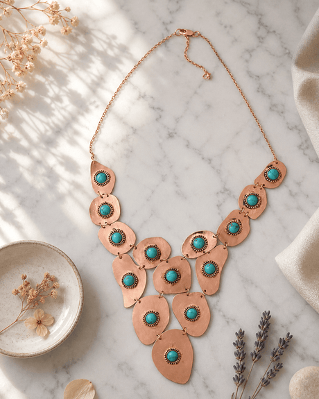Gold-Tone Copper Necklace with Turquoise Polymer Clay Beads — necklaces, editorial marble lifestyle photo