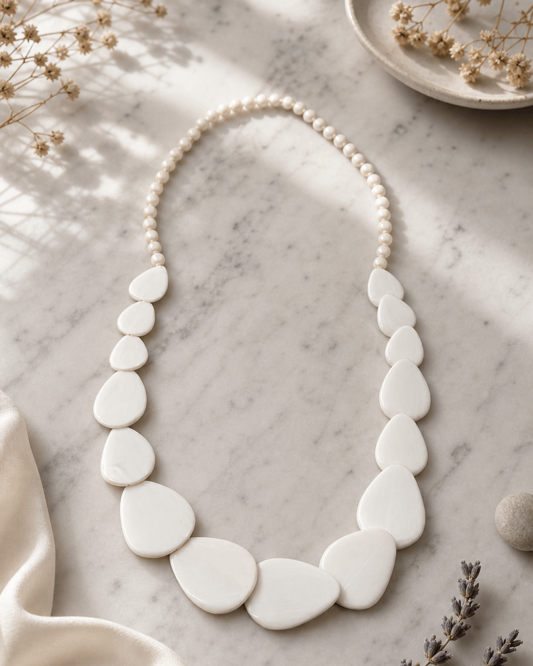 Guitar Pic Inspired Wood Necklace — necklaces, editorial marble lifestyle photo
