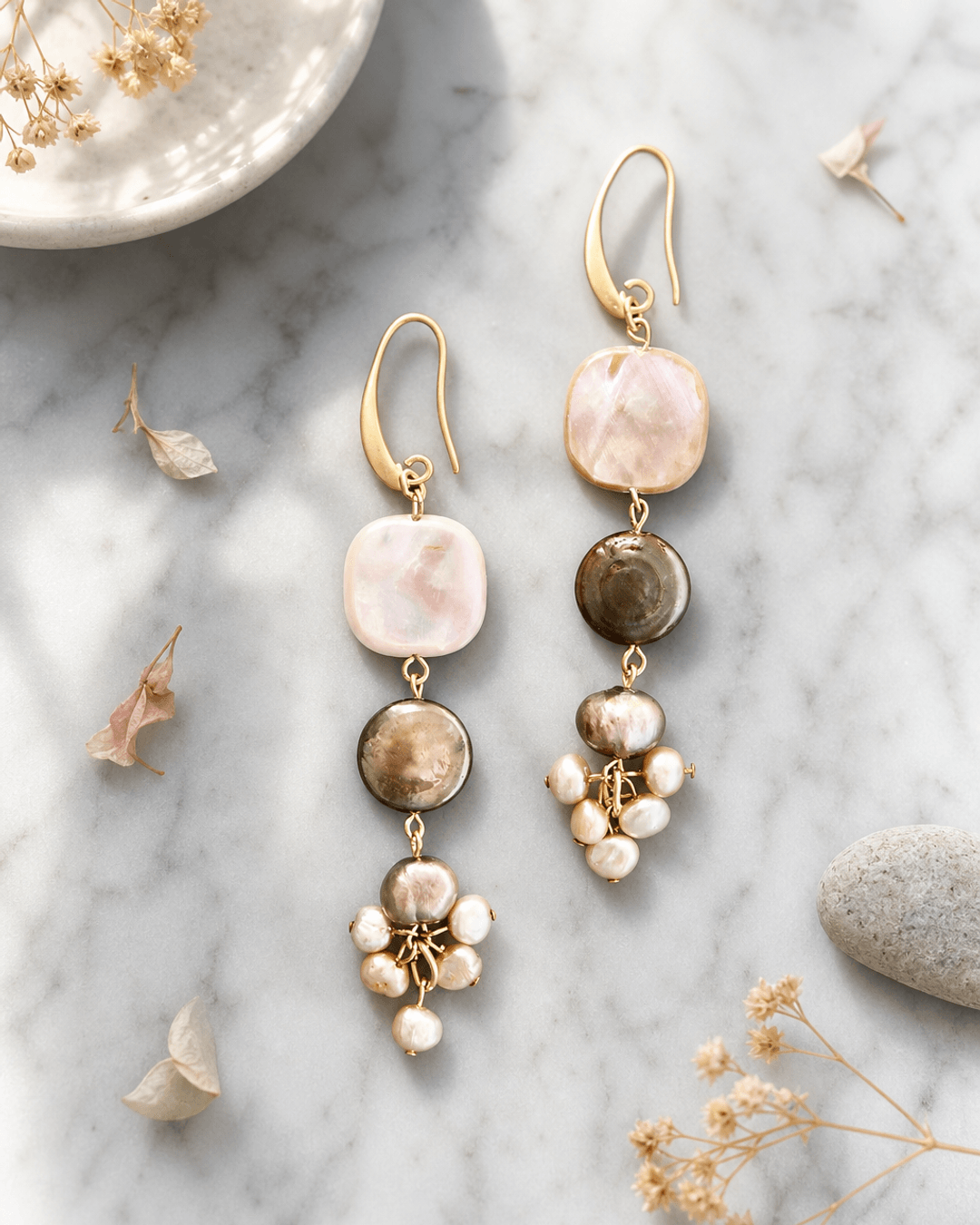 Handcrafted Pearl Cascade Earrings in Soft Iridescence — earrings, editorial marble lifestyle photo