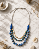 Idra Multi-Strand Natural Bead Necklace – Ecuador — necklaces, editorial marble lifestyle photo