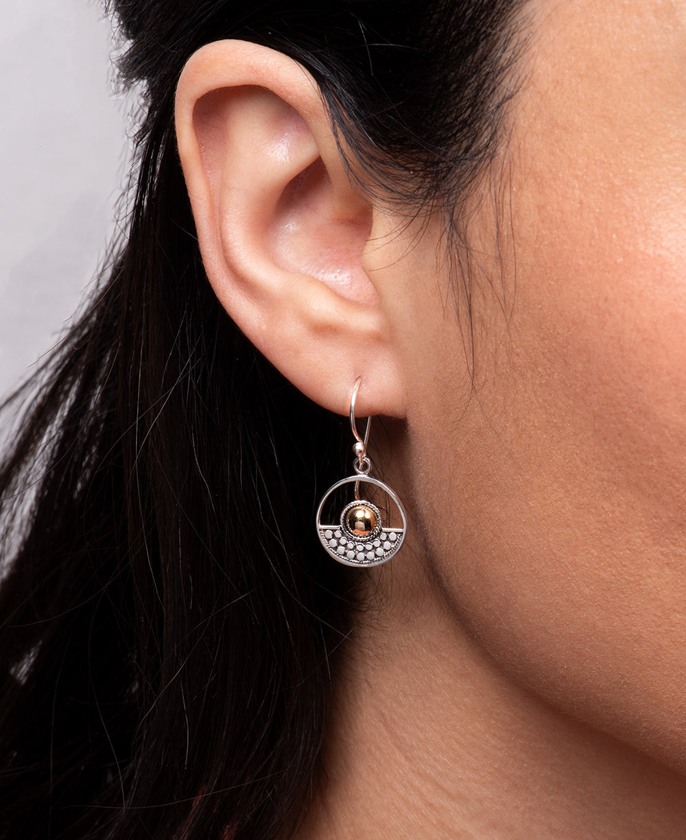 Gold plated center circular earrings