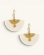 Kenyan hand-carved bone and brass half-moon fan earrings, pair shown flat on neutral background with brass spiral wire detail