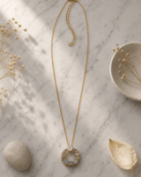 Labradorite Circle Gold Plated Necklace — necklaces, editorial marble lifestyle photo