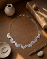 Lotus Petal Link Statement Necklace — necklaces, sunlit shelf lifestyle photo