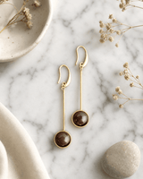 Modern Agate Drop Earrings in Sculptural Brass — earrings, editorial marble lifestyle photo