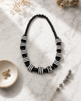 Monochrome Resin Bead Necklace — necklaces, editorial marble lifestyle photo