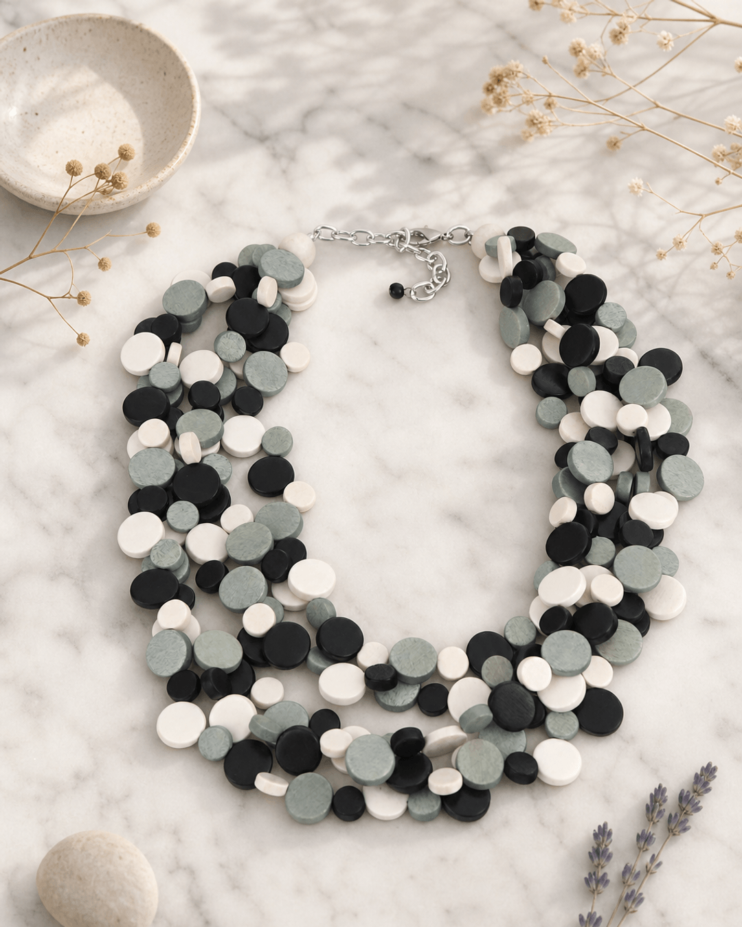 Midnight Shades Wood Disc Necklace — necklaces, editorial marble lifestyle photo