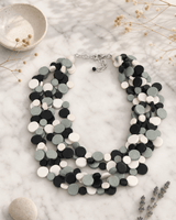 Midnight Shades Wood Disc Necklace — necklaces, editorial marble lifestyle photo