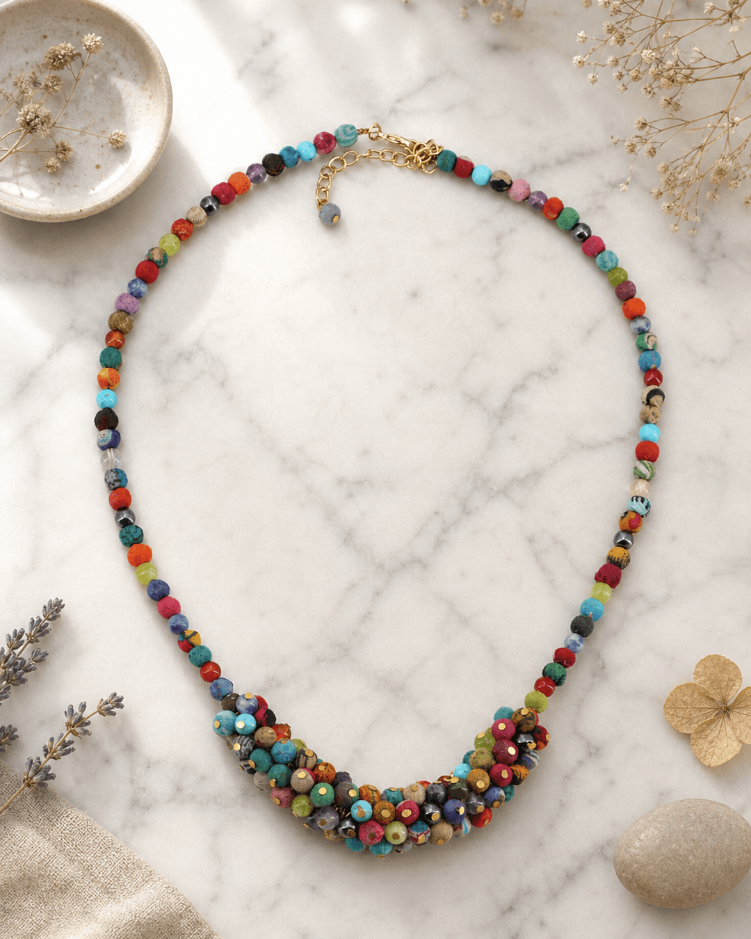 Multicolor Textile & Gemstone Cluster Necklace — necklaces, editorial marble lifestyle photo