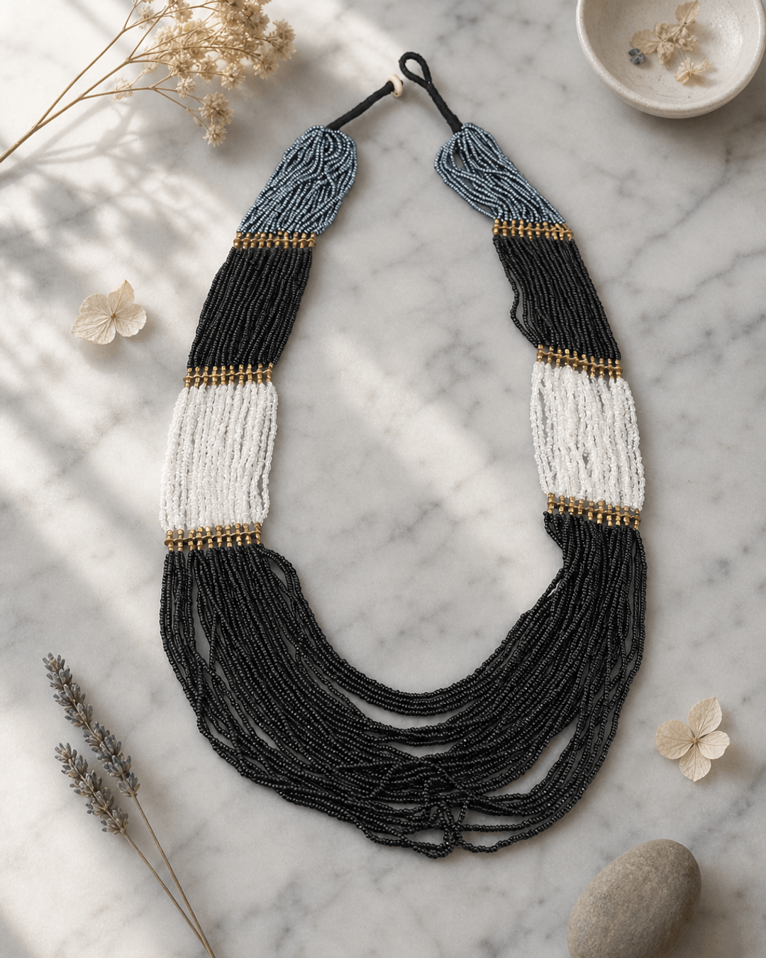 Night Sky Statement Necklace in Black and Grey — necklaces, editorial marble lifestyle photo