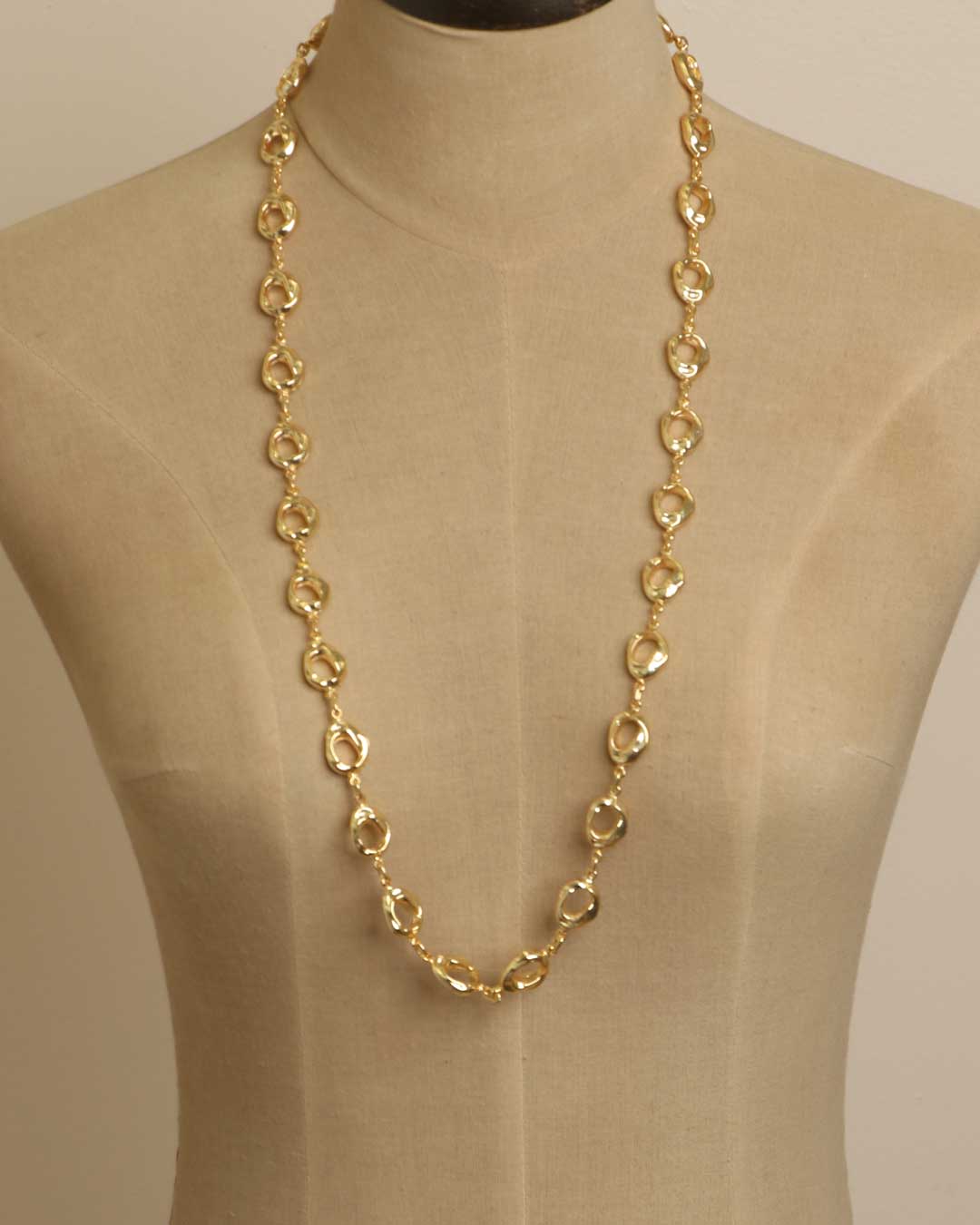Sculpted Open Links Multi Style Necklace in gold worn as a continuous long loop on dress form, displaying the full open-ring link chain