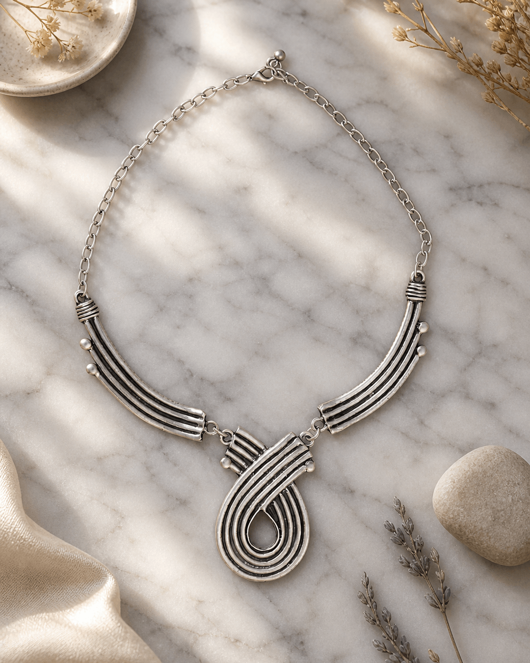 Organic Lines and Curves Statement Necklace — necklaces, editorial marble lifestyle photo
