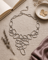 Organic Ovals Statement Necklace — necklaces, flatlay linen lifestyle photo