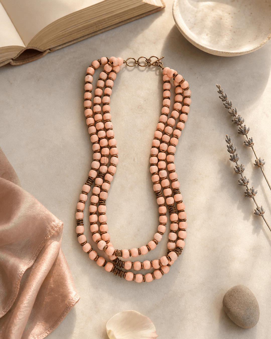 Peach-Pink Multi-Strand Wood Bead Necklace with Brass Accents — necklaces, lifestyle vanity lifestyle photo