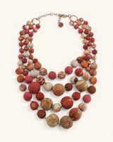 Multicolored beaded necklace on a white background