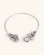 Silver-plated pewter collar necklace shown open on white background, stacked disc clusters visible at both wire ends