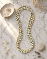 Powder Green Endless Fabric-Wrapped Beaded Necklace — necklaces, editorial marble lifestyle photo