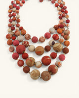 Multicolored beaded necklace on a white background