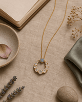 Rainbow Moonstone Circle Gold Plated Necklace — necklaces, flatlay linen lifestyle photo