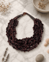 Rich Brown Twist Wood Necklace — necklaces, editorial marble lifestyle photo