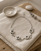 Sculpted Spiral Link Necklace — necklaces, meditation corner lifestyle photo