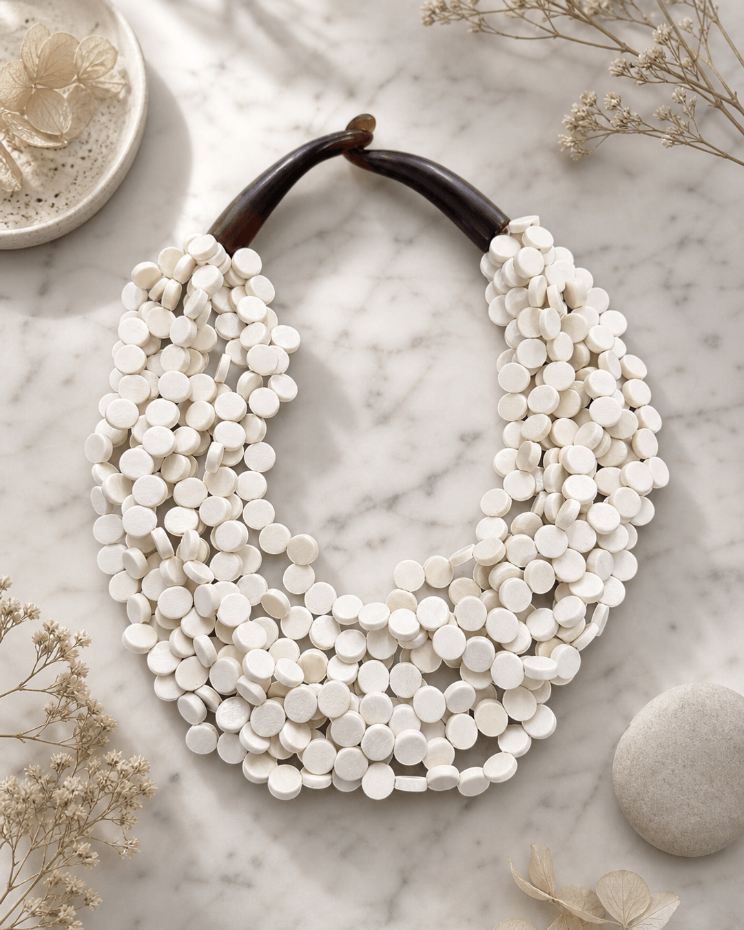 Soft White Twist Wood Necklace — necklaces, editorial marble lifestyle photo