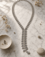 Spiral Elegance Y-Shaped Necklace — necklaces, editorial marble lifestyle photo