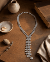 Spiral Elegance Y-Shaped Necklace — necklaces, sunlit shelf lifestyle photo