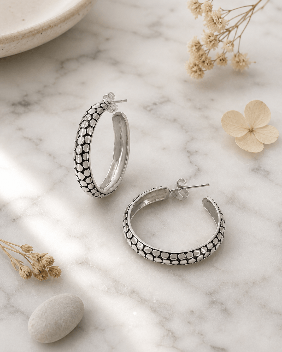 Sterling Silver Hoop Earrings — earrings, editorial marble lifestyle photo