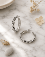 Sterling Silver Hoop Earrings — earrings, editorial marble lifestyle photo