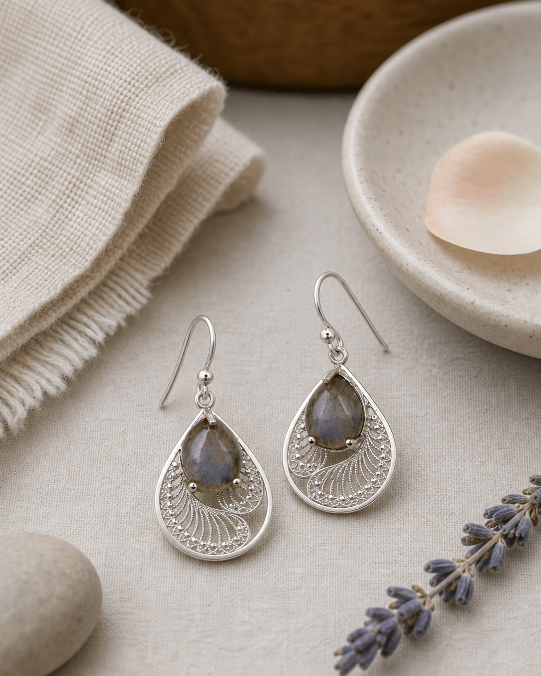 Sterling Silver Labradorite Earrings in Feather Design — earrings, meditation corner lifestyle photo